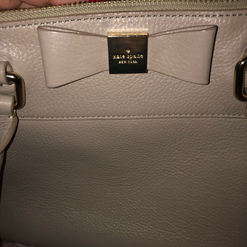 Light pink Kate spade purse.